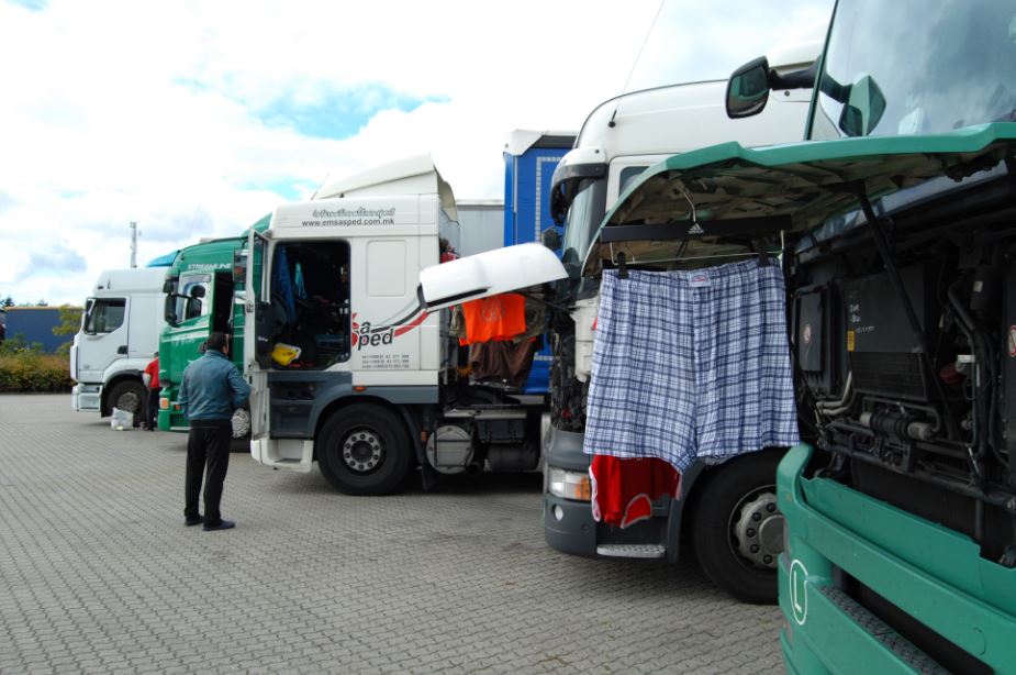 Truck drivers drying their clothes 