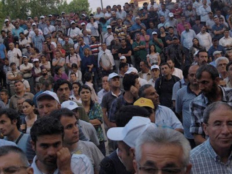 KESK members gather outside a courthouse following the arrests in 2012