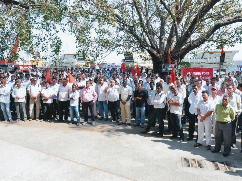 Dock workers protest outside Mumbai Port Trust