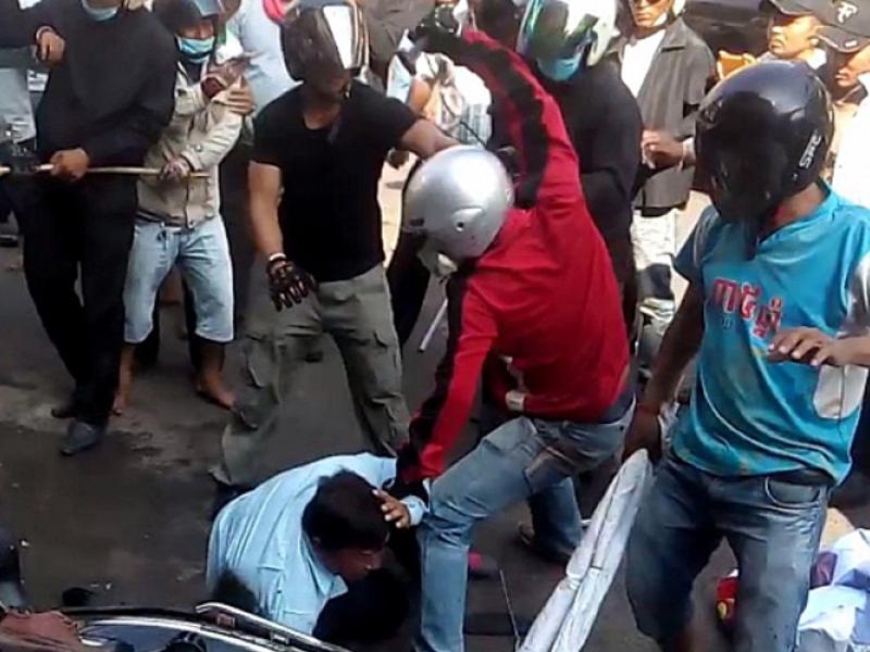Workers being attacked. Photo: Licadho-Cambodia