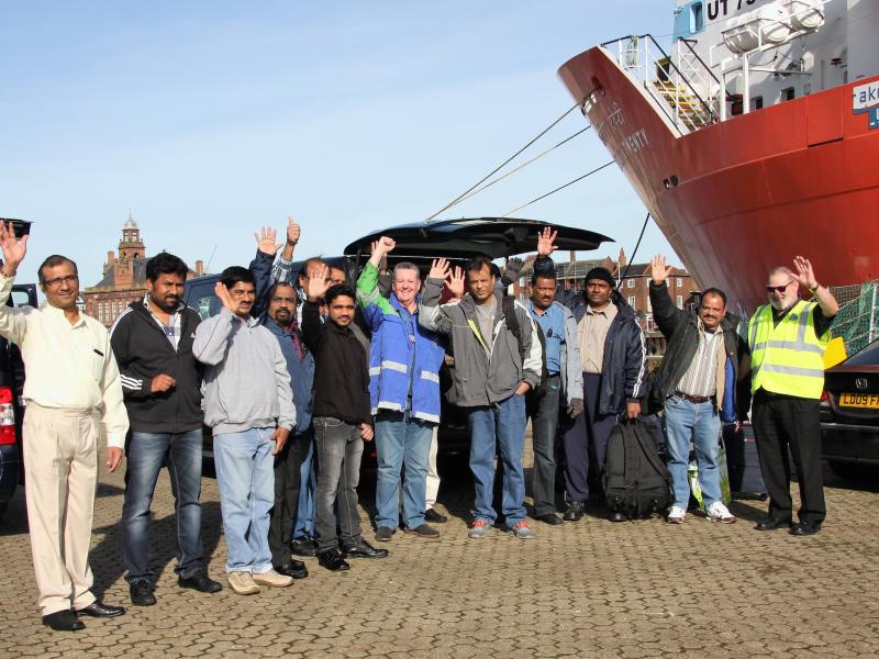 Crew members about to leave for home