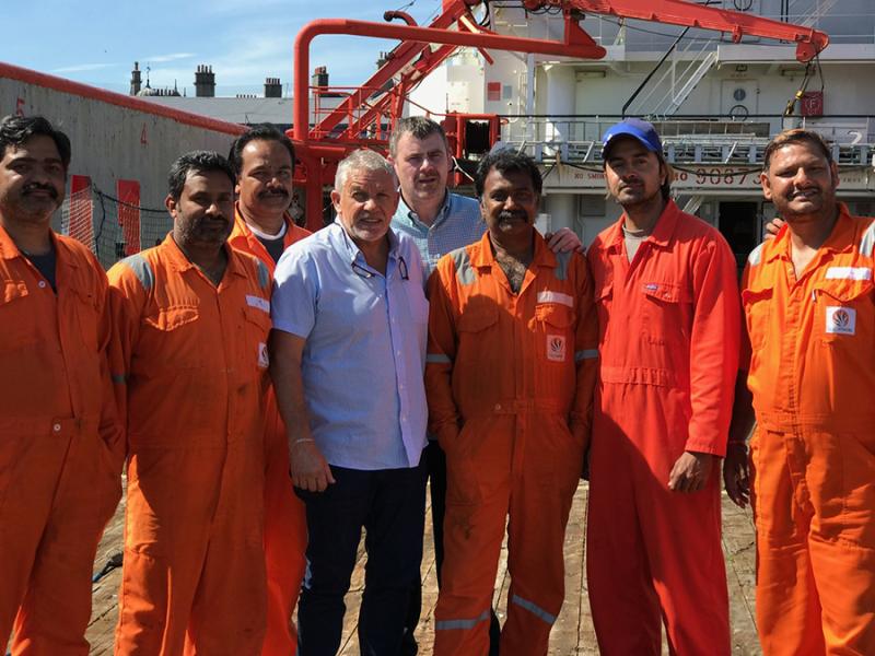 Malaviya Seven crew members with Ken Fleming and ITF inspector Liam Wilson 