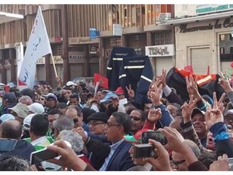 UMT general secretary Al Mukharek (centre) at the demonstration