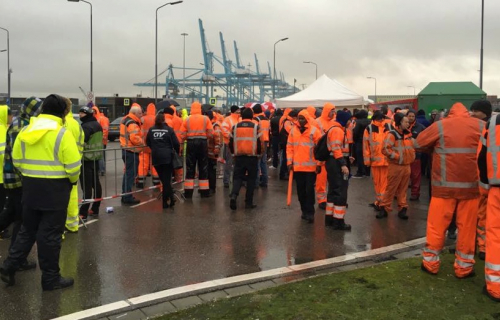Hundreds of Dutch dockers braved the rain on the picket line